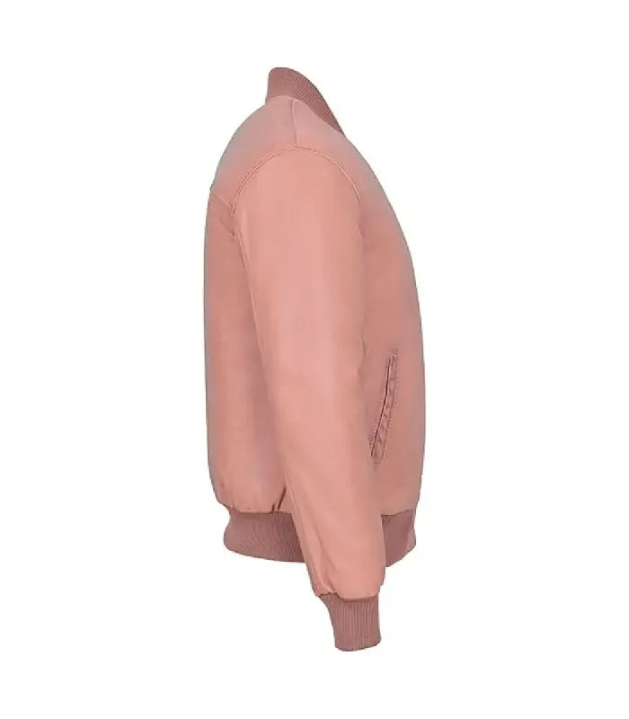 Profile view of a baby pink leather bomber jacket showing sleeve paneling, side welt pocket, and matching ribbed cuff.