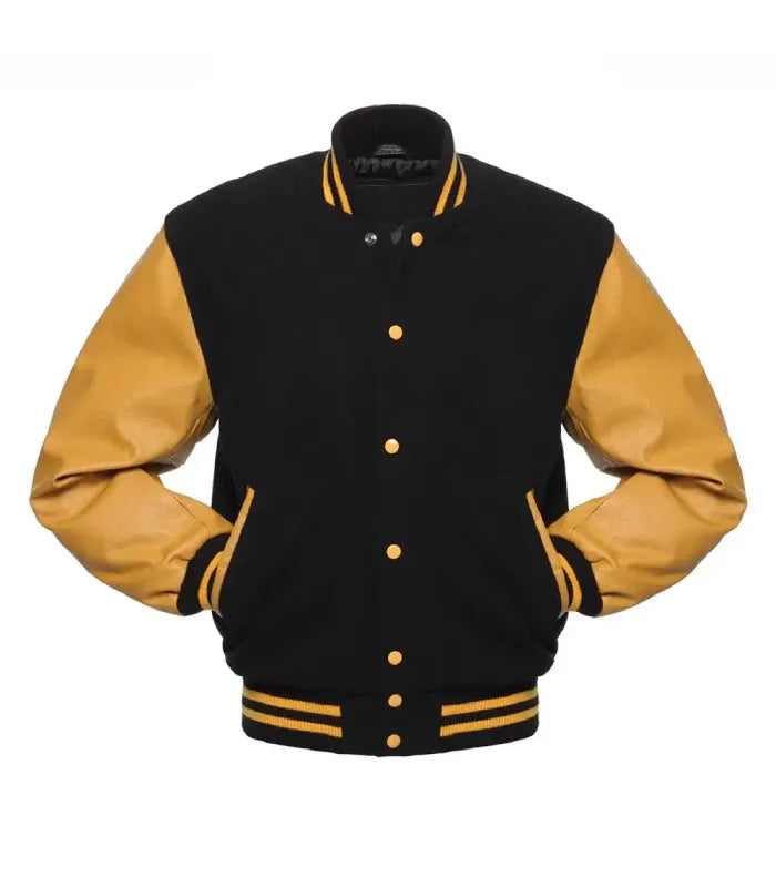Front view of a black and gold varsity jacket displaying both hands tucked into side welt pockets, contrast gold snap buttons, and striped rib trim.