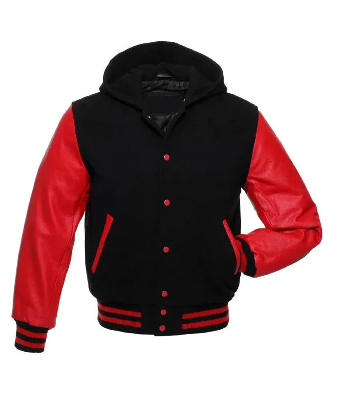 Front pose view of a black and red hooded varsity jacket with red leather sleeves, red snap buttons, and red-trimmed pockets, featuring one hand inserted in the pocket.