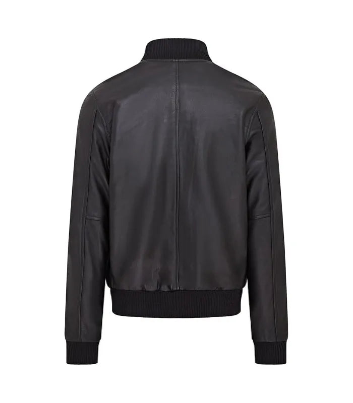 Rear perspective of a black varsity bomber jacket showing center back seam construction and ribbed waist hemline.