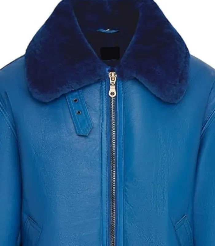 Close-up view of a Blue Shearling Aviator Bomber Leather Jacket featuring a plush dark blue collar, throat latch, and heavy duty front zip fastener.