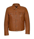 Direct front view of a tan brown leather trucker jacket featuring buttoned chest pockets and side welt pockets.