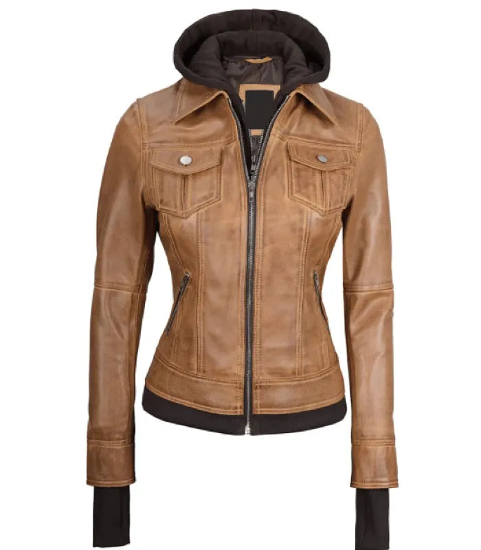 Full front zipped view of a women's camel brown hooded leather bomber jacket with silver zippers, buttoned chest flap pockets, and extended storm cuffs.