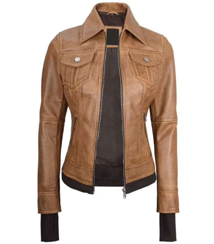Front view of a women's camel brown leather bomber jacket without the hood, featuring a sharp pointed collar, dual flap chest pockets, and extended dark cuffs.
