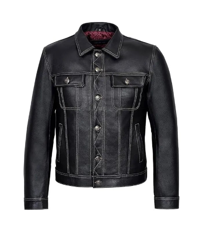A black leather trucker jacket with white contrast stitching, button front closure, and flap chest pockets, shown on a plain white background.