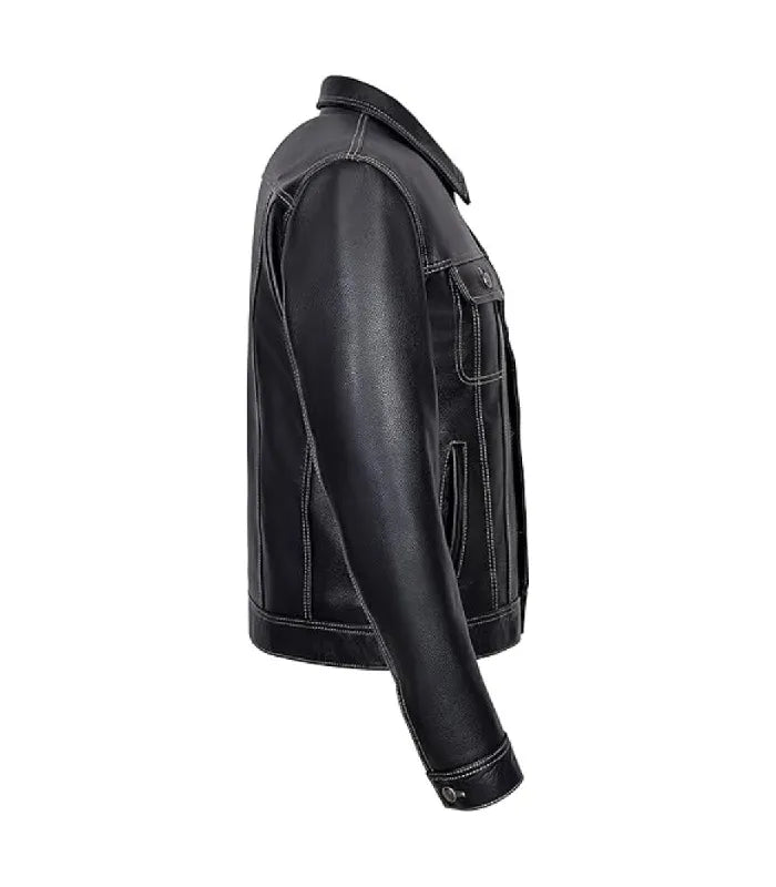 Side profile view of a classic black leather trucker jacket with detailed white contrast stitching along the sleeve and hem.