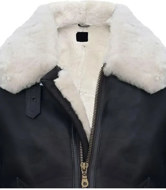 Close-up view of a Cream Black Leather Bomber Shearling Aviator Jacket featuring a thick cream shearling collar, throat latch, and heavy-duty zipper.