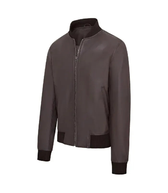 Angled front profile displaying side welt pocket, ribbed collar, and fitted sleeve cuff on a dark brown varsity bomber jacket.