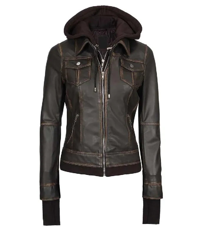 Full front zipped view of a women's dark brown hooded leather bomber jacket with silver metal zippers, buttoned flap pockets, and extended dark storm cuffs.