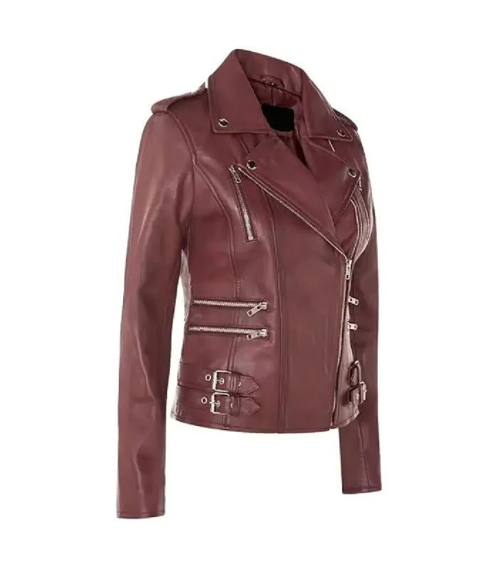 Three quarter view of Ella burgundy leather biker jacket showcasing rich maroon shade, silver zippers, side buckles, and inner lining.