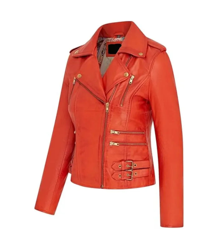 Angled view of Ella orange leather biker jacket showcasing vibrant tone, brass zippers, side buckles, and printed inner lining.