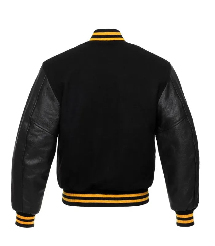 Rear view of a Gold Knit Trim Black Varsity Jacket featuring a black wool body, leather sleeves, and yellow gold striped rib-knit collar, hem, and cuffs.