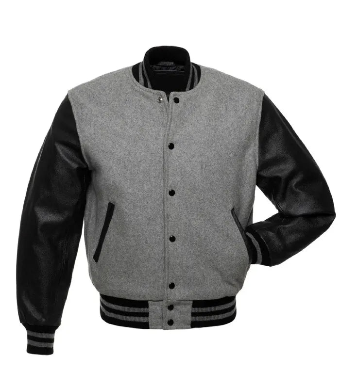 Direct front perspective of grey varsity jacket with genuine black leather sleeves and striped ribbing.