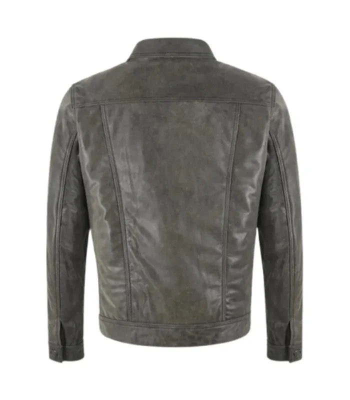 Rear perspective of a grey leather trucker jacket highlighting back yoke stitching and structured paneling.