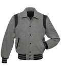 Straight front view of grey wool varsity jacket featuring shirt collar, black snap buttons, and contrast shoulder trim.