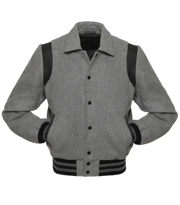 Front view of grey wool varsity jacket showing black snap button closure and side pockets.