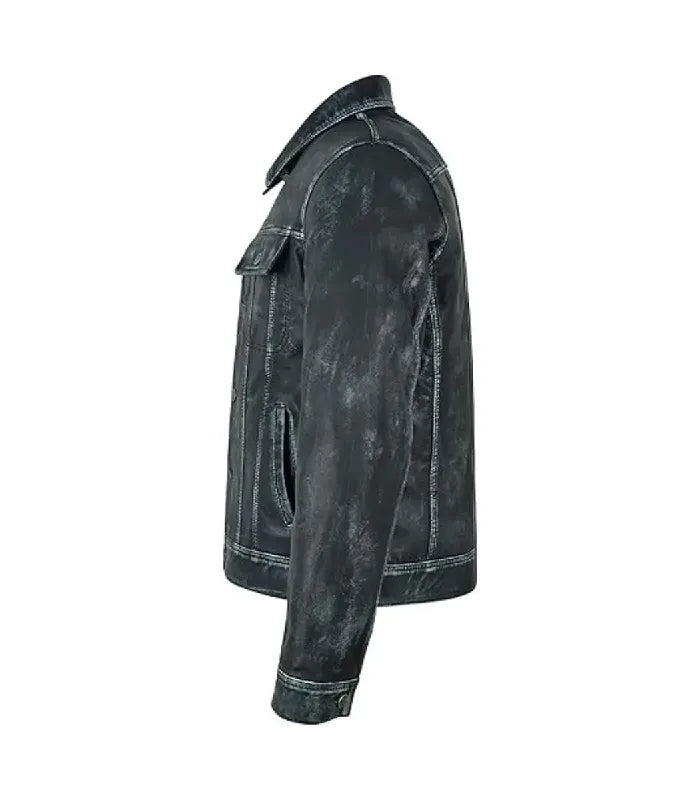 Side profile view of a distressed navy leather trucker jacket showing sleeve panel stitching, buttoned cuffs, classic shirt collar, and side pocket.