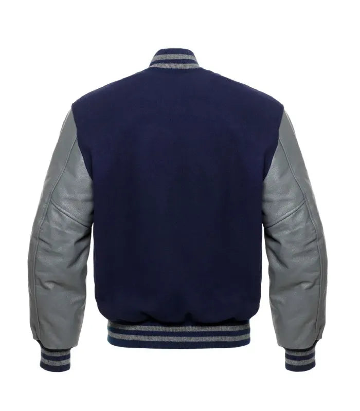 Full rear view of navy blue wool body paired with slate grey leather arms and striped rib-knit hem.