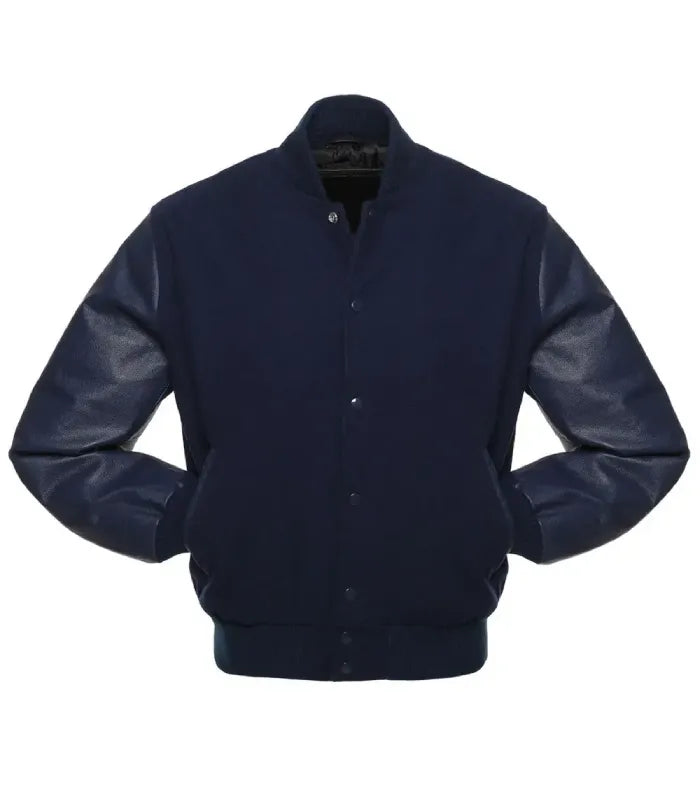 A navy blue varsity-style jacket with dark leather sleeves, featuring a button-up front, ribbed collar, cuffs, and hem, and side pockets.