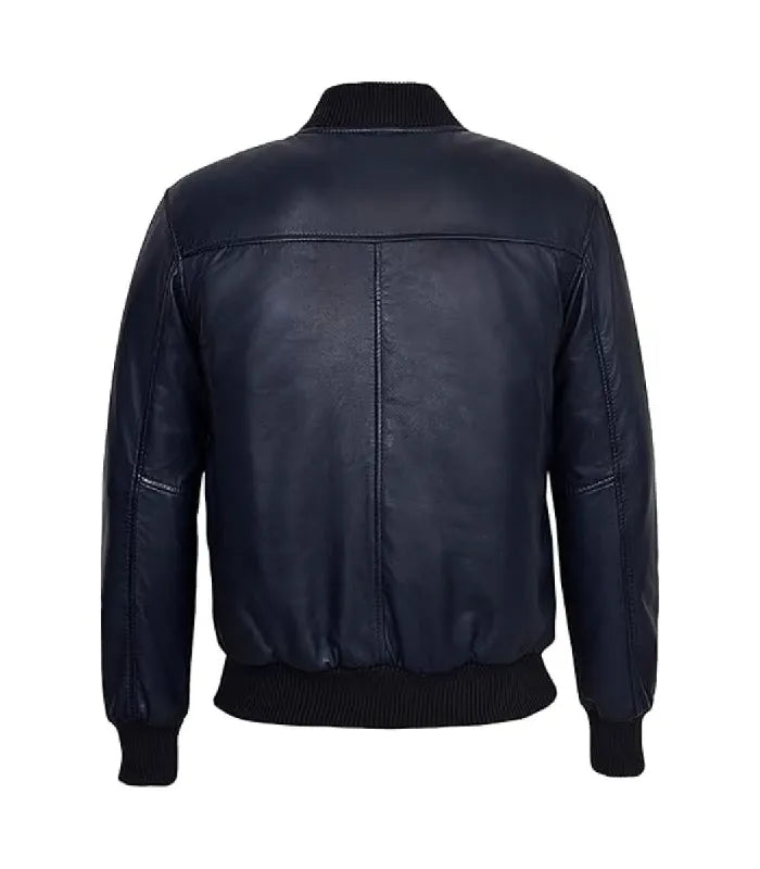 Back view of a navy leather bomber jacket displaying clean shoulder yoke stitching, vertical center seam, and ribbed collar.