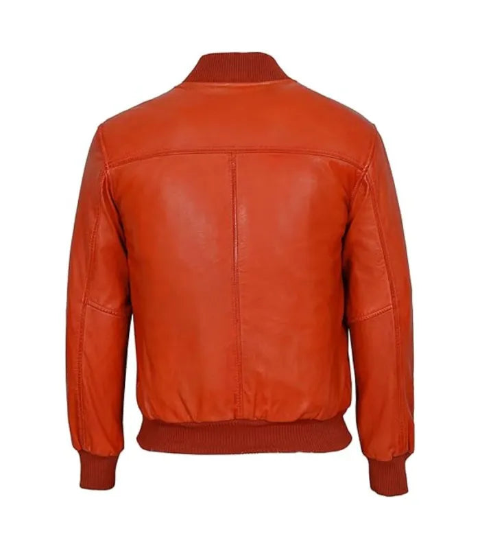 Back view of an orange leather bomber jacket displaying clean shoulder yoke stitching, vertical center seam, and ribbed collar.