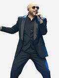 Pitbull performing in I'm Back Tour 2026 black tuxedo blazer