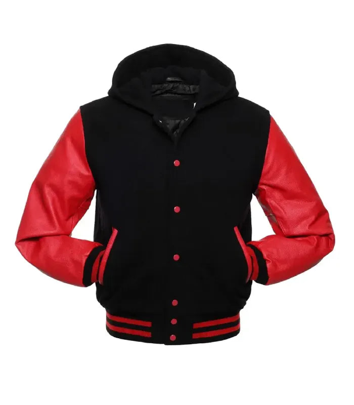 Front view of a black and red hooded varsity jacket showing both hands tucked into side welt pockets, red contrast snap closures, fleece hood, and red-striped ribbed trim.