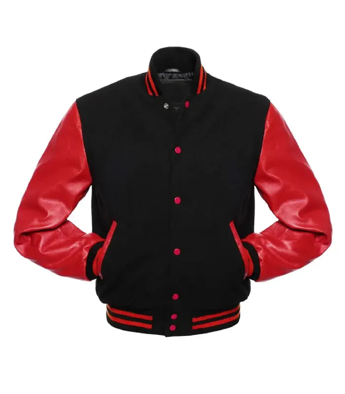 Front view of a black and red varsity jacket displaying both hands tucked into side welt pockets, contrast red snap buttons, and striped rib trim.