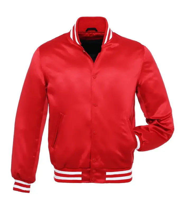 Front view of a red satin varsity jacket with red snap buttons, white-striped ribbed collar and cuffs, and one hand in pocket.