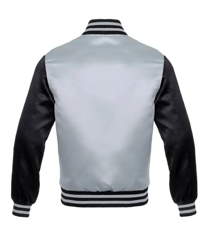 Back view of a satin varsity jacket with a light silver satin body and black satin sleeves, featuring striped ribbed collar, cuffs, and hem.