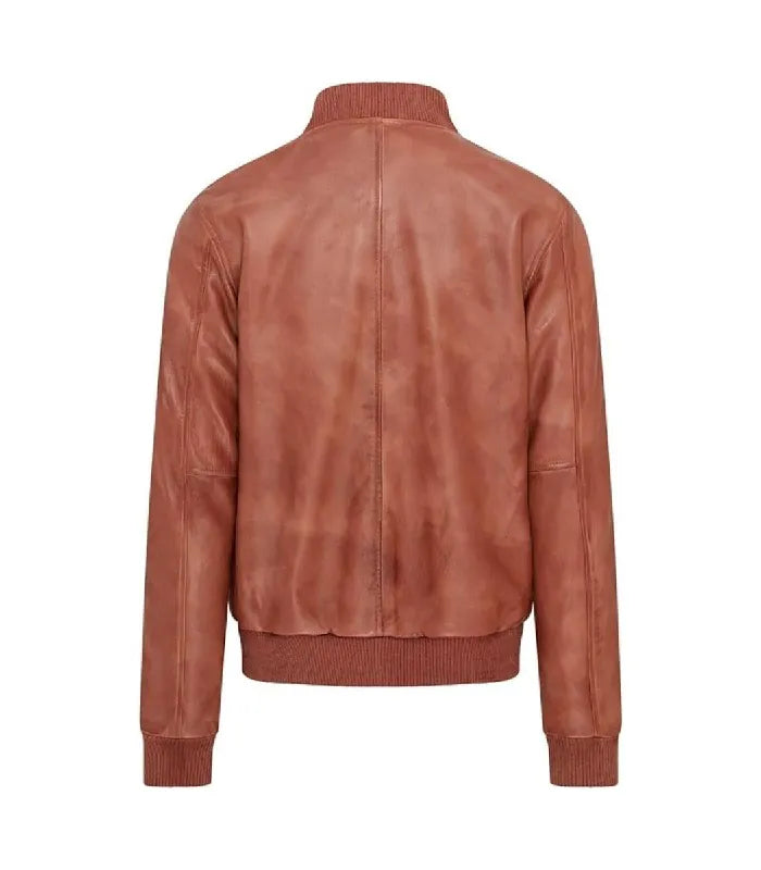 Rear perspective of a tan varsity bomber jacket showing fitted back seam stitching and ribbed hemline.