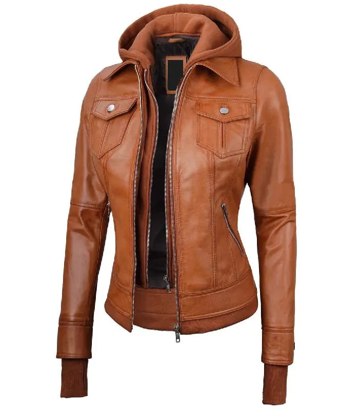 Three-quarter angle view of a women's tan hooded leather bomber jacket featuring an inner zipped fleece layer, classic collar, and side zipper pockets.