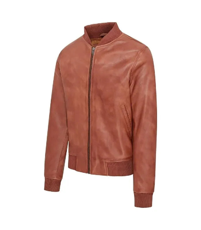 Angled front profile highlighting side welt pocket, ribbed collar, and sleeve cuffs on a tan varsity bomber jacket.