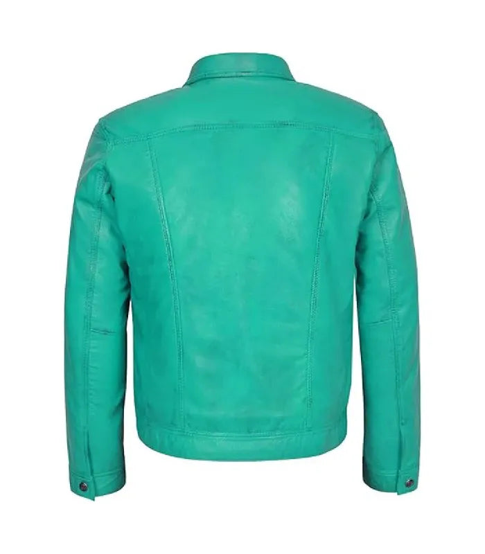 Rear perspective of a bright turquoise leather trucker jacket showing structured seam panels.