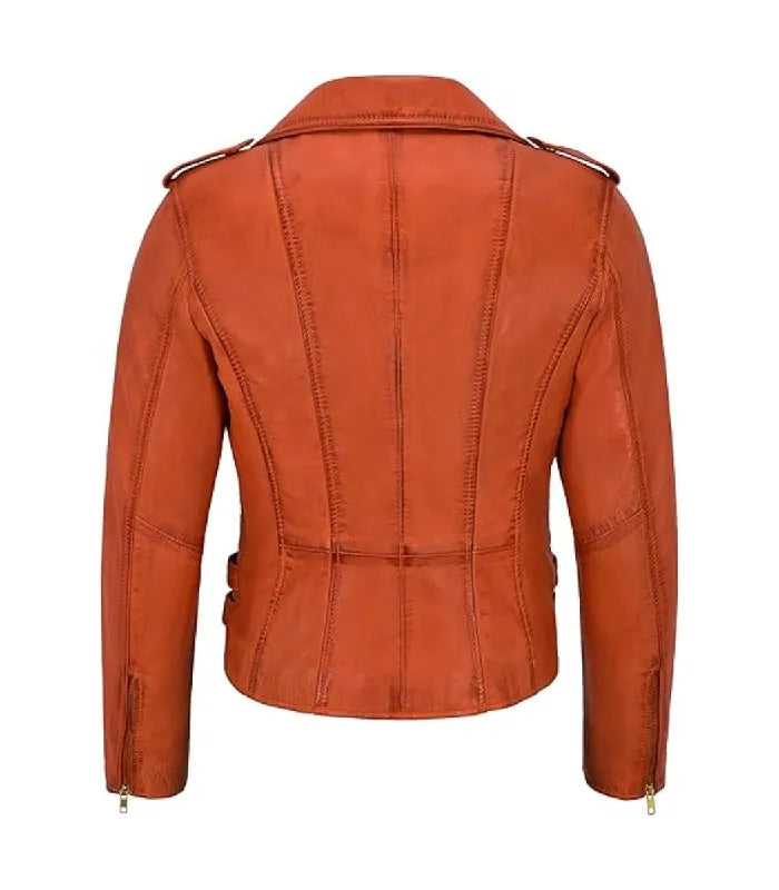 Rear view of a Womens Vintage Orange Leather Biker Jacket displaying vertical back seam paneling, a classic wide collar, shoulder epaulets, and brass zippered wrist cuffs.