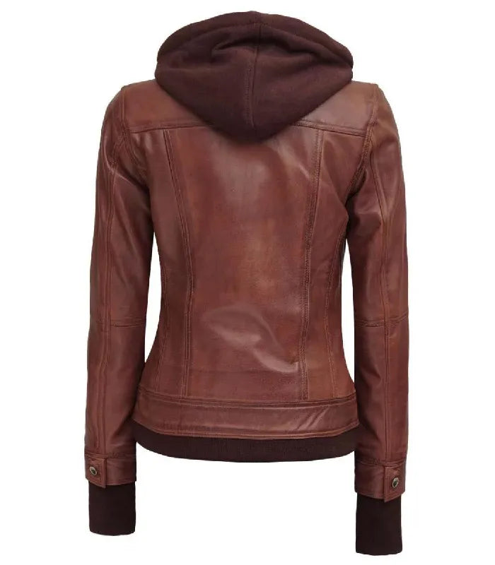 Rear view of a women's brown hooded leather bomber jacket displaying structured vertical seams, attached brown fleece hood, and ribbed waist trim.