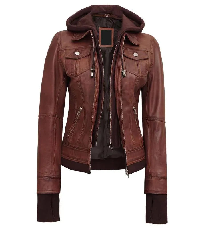Front open view of a women's brown hooded leather bomber jacket showing a detachable brown fleece hood, double zipper closure layer, and side zip pockets.