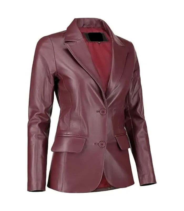 Three-quarter angle view of a Womens Burgundy Leather Blazer displaying notch lapels, a tailored silhouette, and flap waist pockets.
