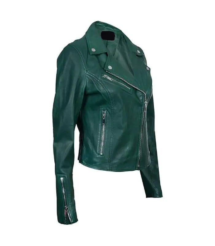Angled front profile showcasing asymmetrical zipper, lapel studs, and zipper cuff detail on a women's green biker leather jacket.