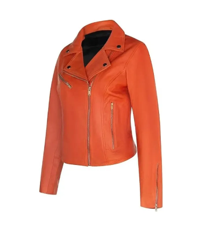 Angled front view of a women's classic orange biker leather jacket displaying asymmetrical front zip and sleeve zipper cuff details.