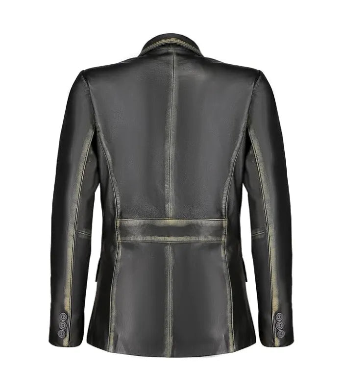 Rear view of a Womens Distressed Black Leather Blazer showing structured panel seams, waist band detailing, distressed edges, and buttoned cuffs.