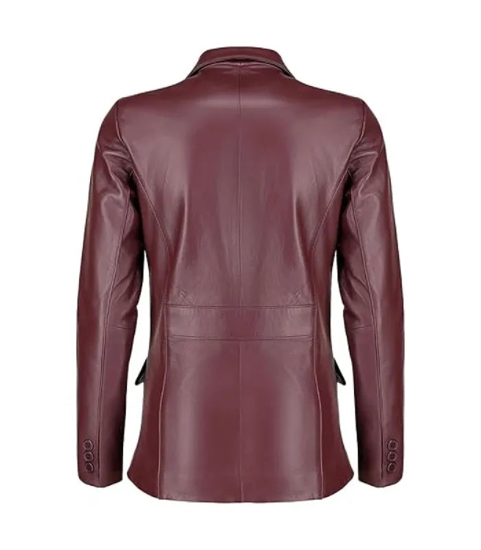 Rear view of a Womens Burgundy Leather Blazer showing structured panel stitching, a back waist band, and three-button cuffs.