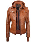 Front open view of a women's tan hooded leather bomber jacket showing a matching tan fleece hood, double zipper layer, and silver hardware.