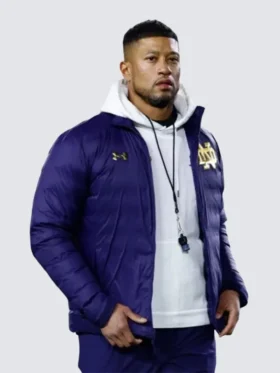 A navy blue Notre Dame Puffer Jacket with a high-quality quilted design.